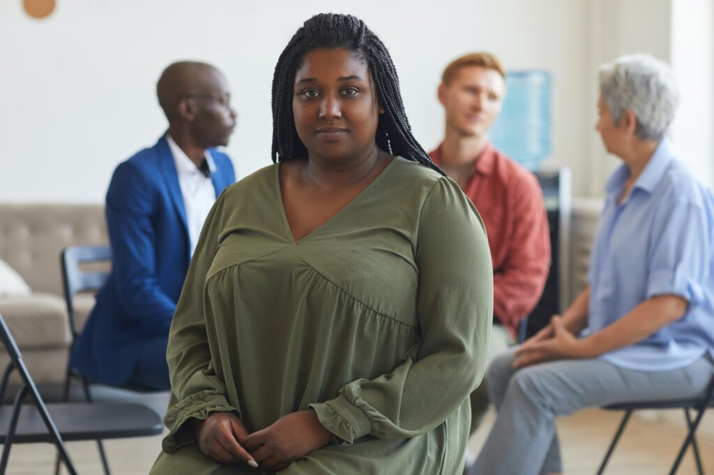 African-American Woman at Group Therapy Session